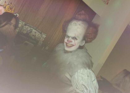 A photo of my friend dressed as Pennywise at the party